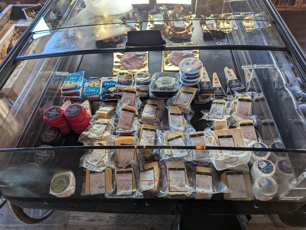 Deli counter with cheeses and charcuterie