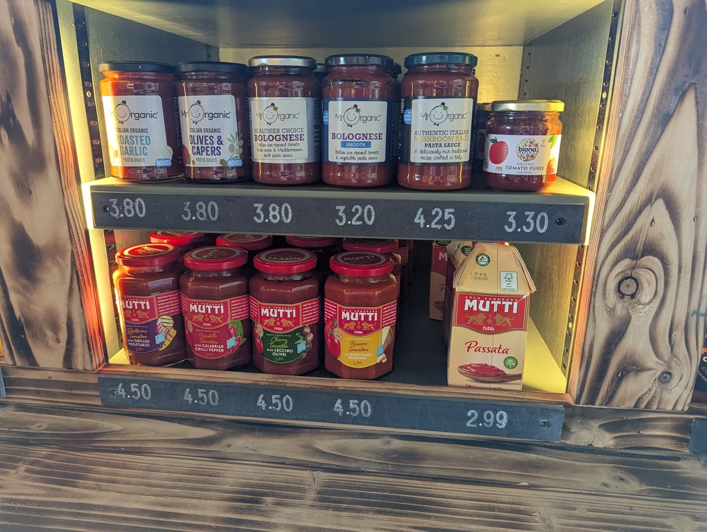 Organic sauces and Italian produce on shelves
