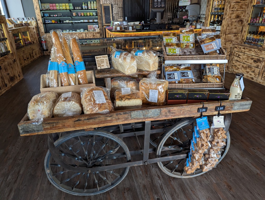 Artisan breads and baguettes on vintage cart